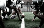 stock-footage-the-defensive-and-offensive-lines-of-two-football-teams-meet-at-the-line-of-scrimmage-high